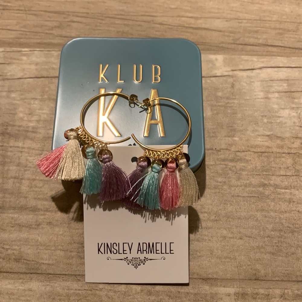 Kinsley Armelle Gold hoop earrings.
